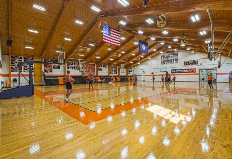 Walter Davis Gym court with orange key and American flag