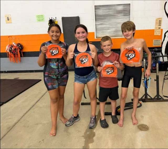 🎉 Congratulations to Our Swimmers! 🏊🧡🖤

We are incredibly proud to celebrate these swimmers for reaching an exciting milestone in their swimming journey!

👏 Congratulations to those who have advanced to our Intermediate Group and earned their Orange Caps!
👏 Congratulations to our swimmers who have progressed to our Advanced Group and earned their Black Caps!

Moving up is a testament to your hard work, dedication, perseverance, and commitment to improving every time you step into the pool. Your coaches have watched you grow in confidence, technique, and determination, and we couldn't be more proud of what you've accomplished.

Keep setting goals, supporting your teammates, and striving to be your best. This is just the beginning of many more achievements to come!

Please join us in congratulating these amazing swimmers on this well-deserved accomplishment! 🐅💪